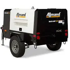 A black and white trailer with an almond logo.