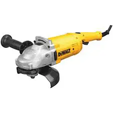 A yellow and black angle grinder is on the ground