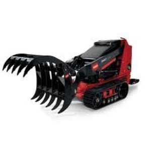 A red and black mini loader with a large claw.