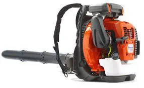 A close up of an orange and black leaf blower