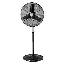 A black stand fan with a metal base.