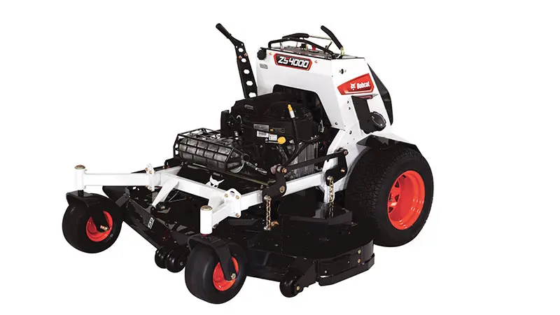 A white and black lawn mower with a basket on the side.